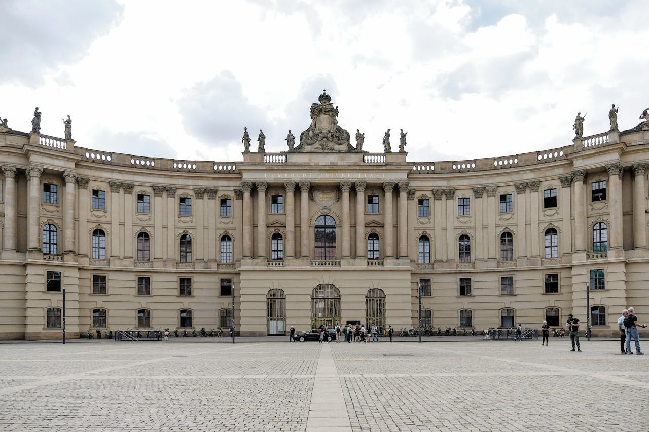 gallery-1 Elegant facade of Humboldt University's library in Berlin, showcasing neoclassical architecture.